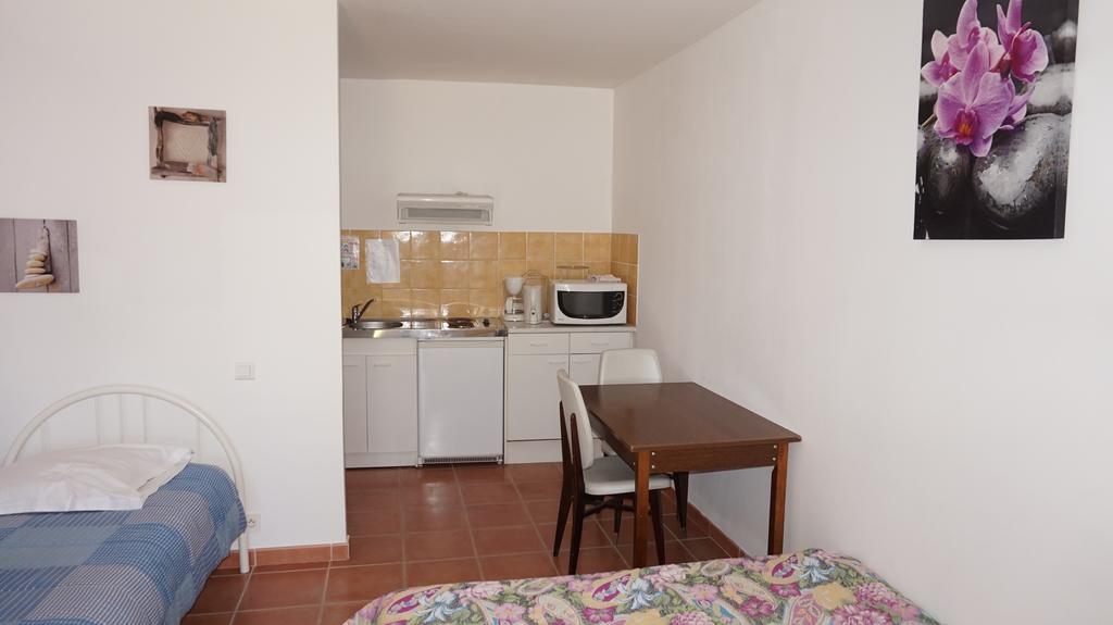 Appartements " Le Clos De La Cerisaie" แกสติญง-ดู-การ์ ภายนอก รูปภาพ