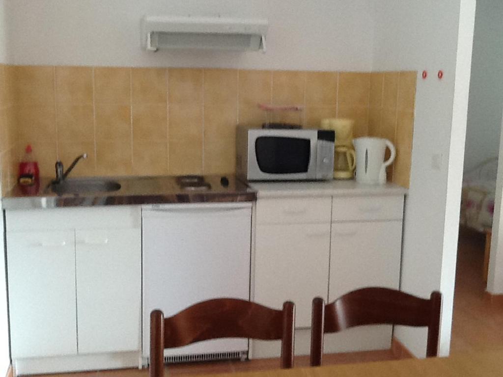 Appartements " Le Clos De La Cerisaie" แกสติญง-ดู-การ์ ห้อง รูปภาพ
